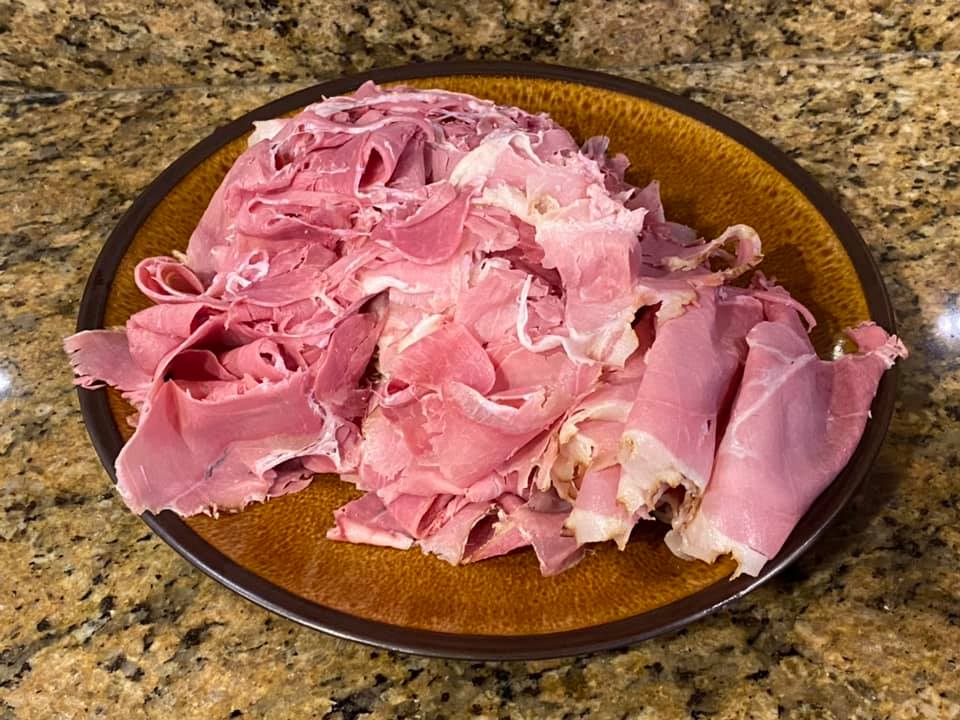 The thin sliced picnic ham and our meat slicer that did it’s usua