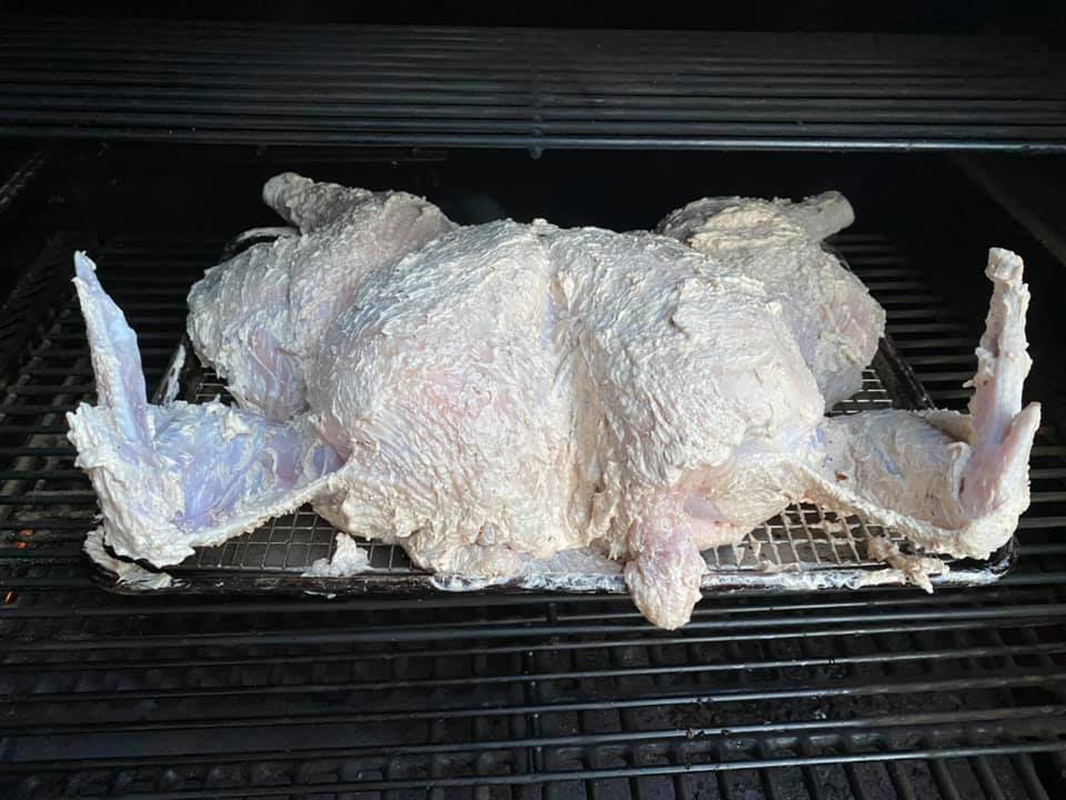And the turkey is in the smoker on hardwood at 240 F for four hours